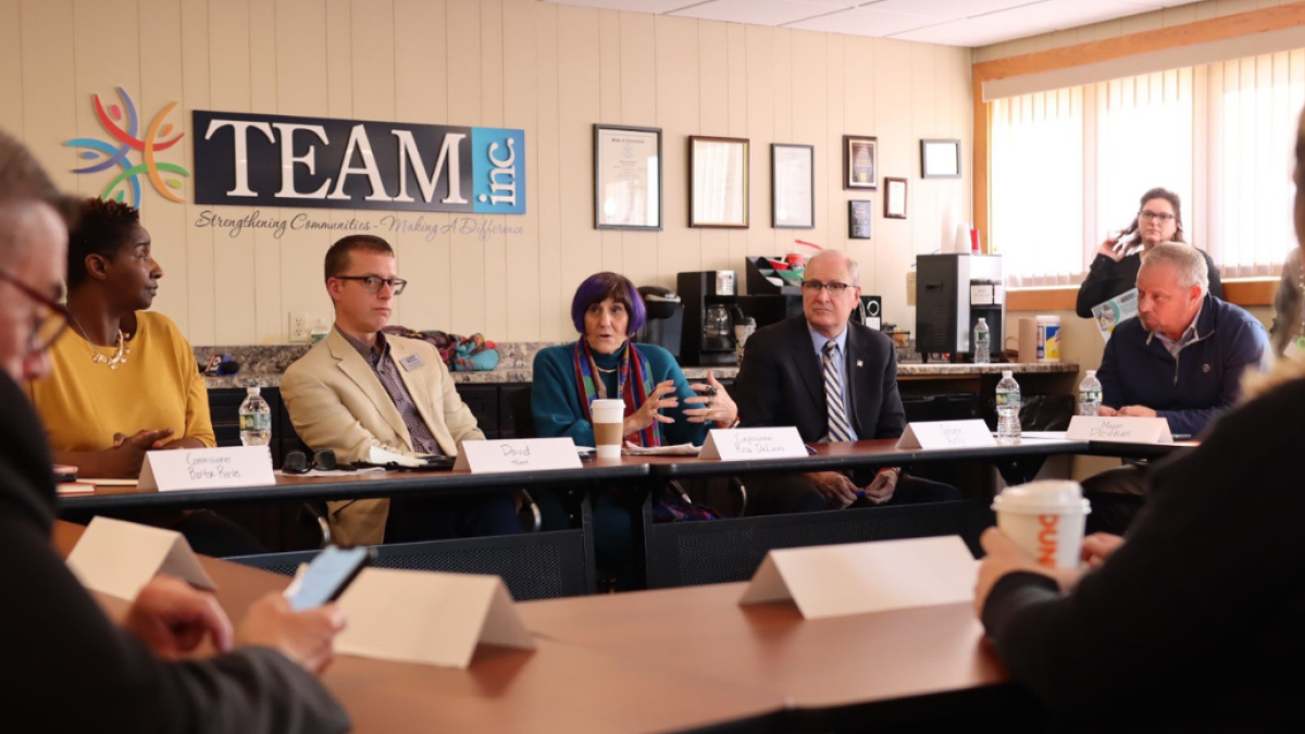 Rosa sitting at a round table with advocates talking about the importance of clean and renewable American energy