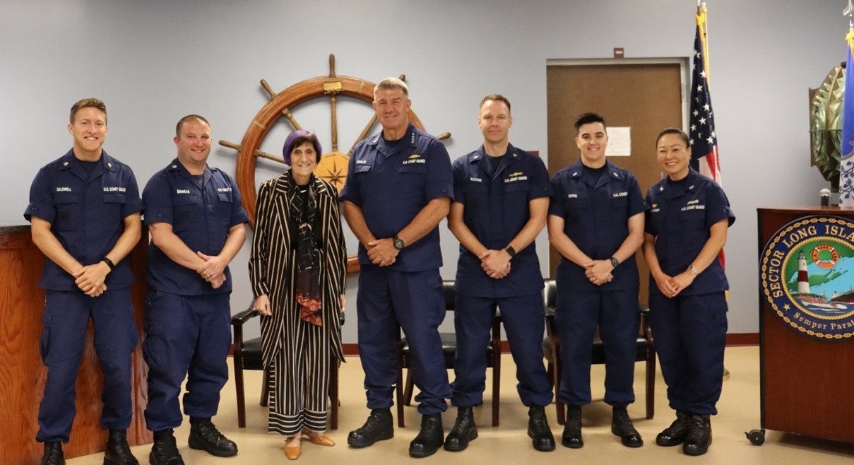 Chair DeLauro with Admiral Schultz, Captain Van Camp, Members of USCG